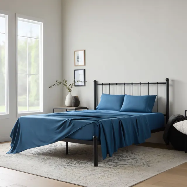 Blue rayon from bamboo blend sheets on a bed